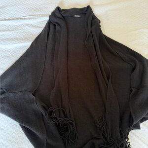Chic Black Poncho with Fringe by [Brand]